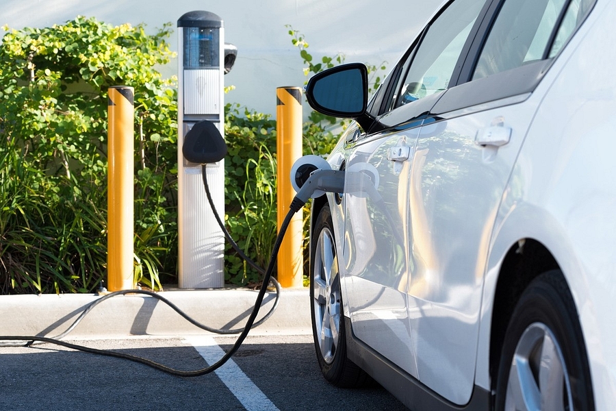Electric vehicle charging station development