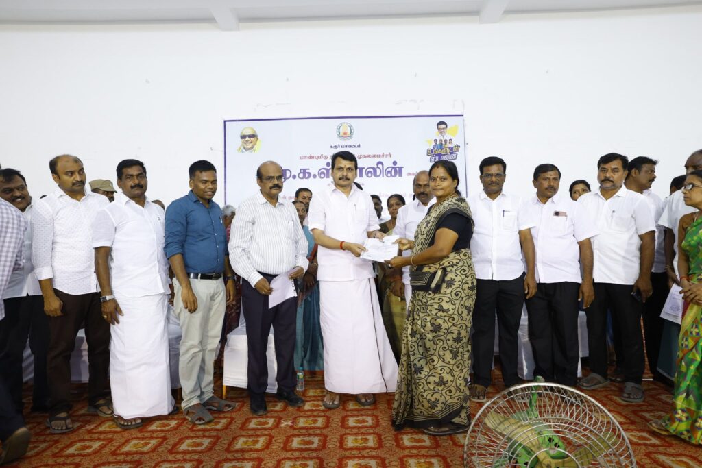 V. Senthil Balaji receiving petitions from the public during the #UngaludanStalin special camp at Chinna Kongu Mandapam, Karur, alongside Karur District Collector Thiru. Thangavel, IAS, and local representatives.