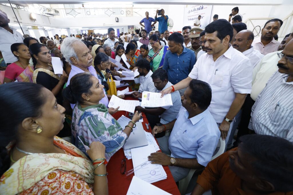 V. Senthil Balaji receiving petitions from the public during the #UngaludanStalin special camp at Chinna Kongu Mandapam, Karur, alongside Karur District Collector Thiru. Thangavel, IAS, and local representatives.