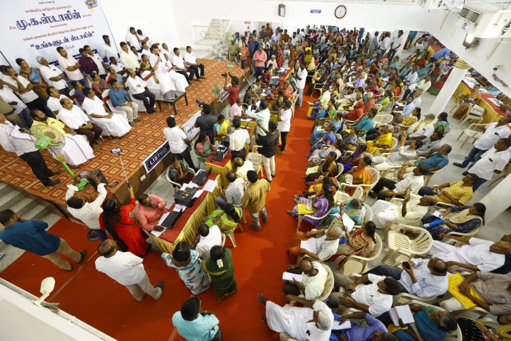 V. Senthil Balaji receiving petitions from the public during the #UngaludanStalin special camp at Chinna Kongu Mandapam, Karur, alongside Karur District Collector Thiru. Thangavel, IAS, and local representatives.
