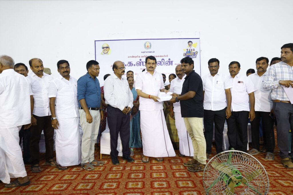 V. Senthil Balaji receiving petitions from the public during the #UngaludanStalin special camp at Chinna Kongu Mandapam, Karur, alongside Karur District Collector Thiru. Thangavel, IAS, and local representatives.
