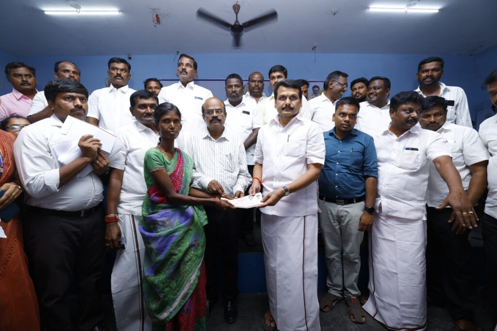 V. Senthil Balaji receiving petitions from residents during the #UngaludanStalin special camp at Periyar Nagar Community Hall, Andankoil East Panchayat, Karur district — in the presence of Karur District Collector Thiru. Thangavel, IAS, local representatives, and the public.