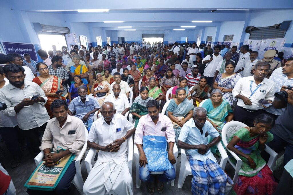 V. Senthil Balaji receiving petitions from residents during the #UngaludanStalin special camp at Periyar Nagar Community Hall, Andankoil East Panchayat, Karur district — in the presence of Karur District Collector Thiru. Thangavel, IAS, local representatives, and the public.
