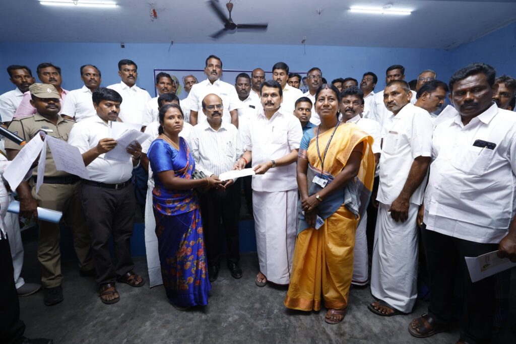 V. Senthil Balaji receiving petitions from residents during the #UngaludanStalin special camp at Periyar Nagar Community Hall, Andankoil East Panchayat, Karur district — in the presence of Karur District Collector Thiru. Thangavel, IAS, local representatives, and the public.