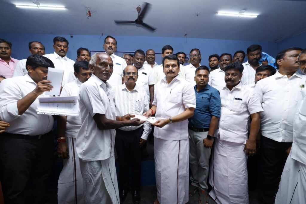V. Senthil Balaji receiving petitions from residents during the #UngaludanStalin special camp at Periyar Nagar Community Hall, Andankoil East Panchayat, Karur district — in the presence of Karur District Collector Thiru. Thangavel, IAS, local representatives, and the public.